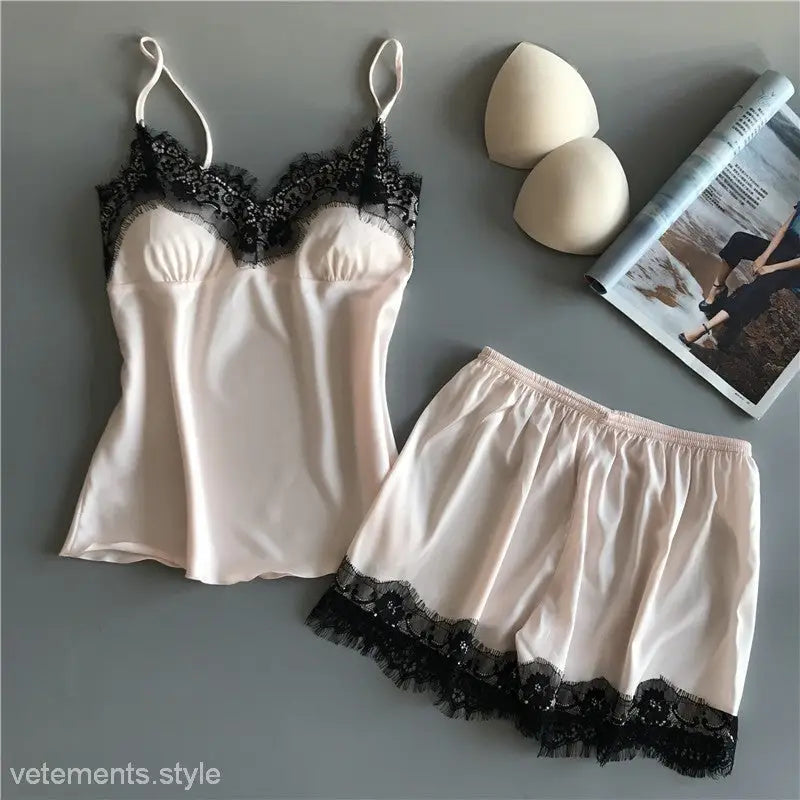 Silky white lingerie set with black lace trim from the Seasonless Lingerie Set collection