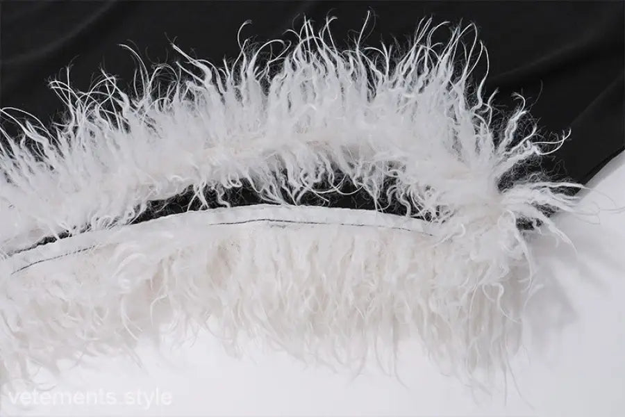 Fluffy white feather with wispy strands on Maxi Dress with high grade fur stitching