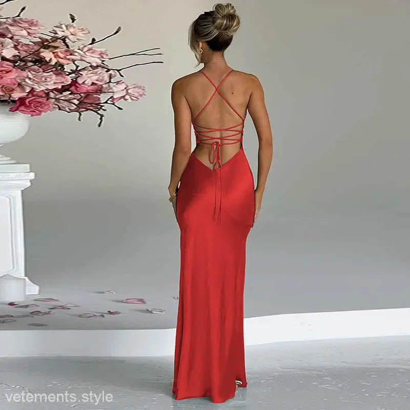 Red backless dress with criss-cross straps and fitted silhouette for summer events