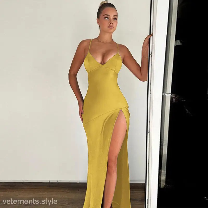 Yellow satin backless dress with high slit and spaghetti straps for summer events