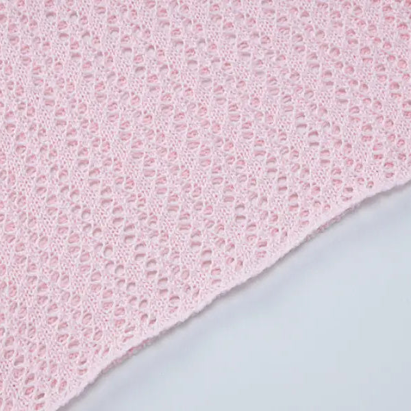 Light pink crocheted fabric for backless knitted dress, perfect for parties and clubs