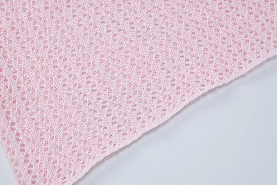 Light pink crocheted fabric for backless knitted dress, perfect for parties and clubs