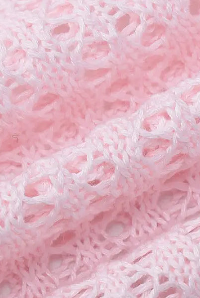 Pink open-knit fabric showcasing a sexy backless knitted dress for parties and clubs