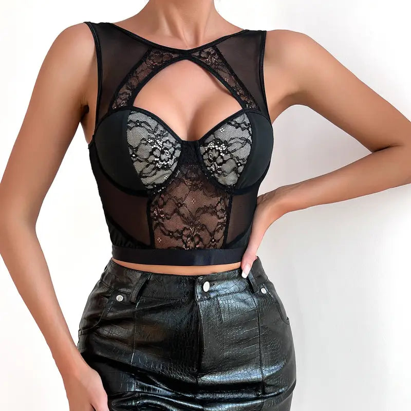 Black lace grenadine crop top with mesh details and leather pants for summer style