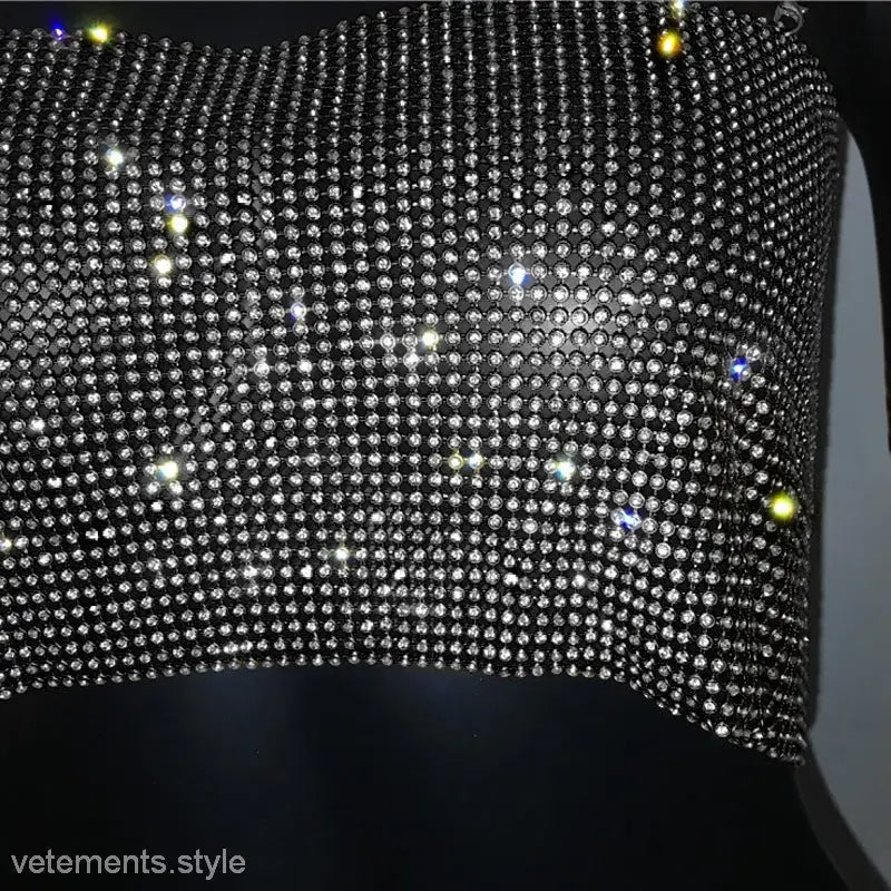 Glittering rhinestone-encrusted chain camisole corset with black trim for a sexy look