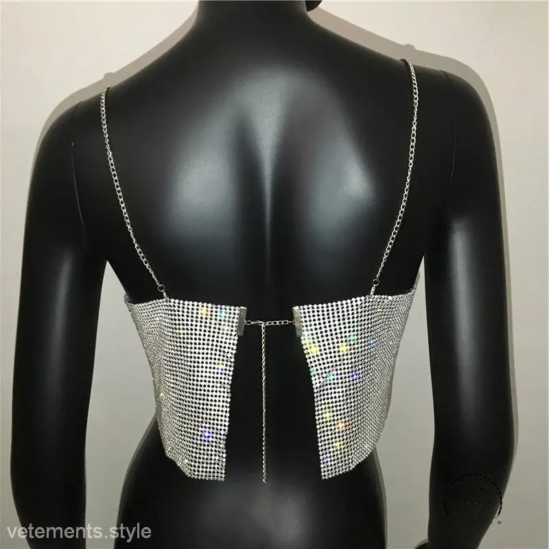 Glittery silver chain camisole corset with backless lace on mannequin