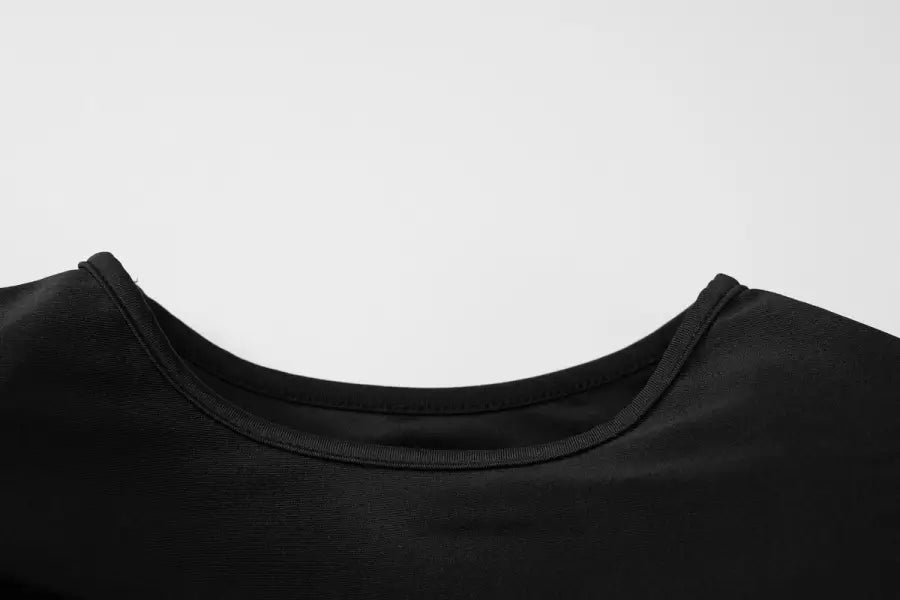 Black scoop neck top paired with a sexy cutout slim fit maxi dress for parties and clubs