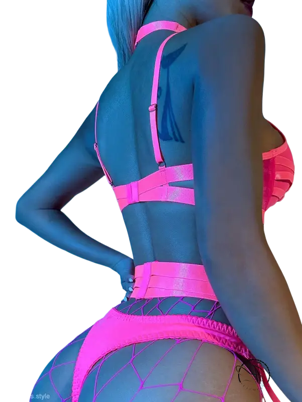 Vibrant neon pink fishnet lingerie set with sexy cutout stitching