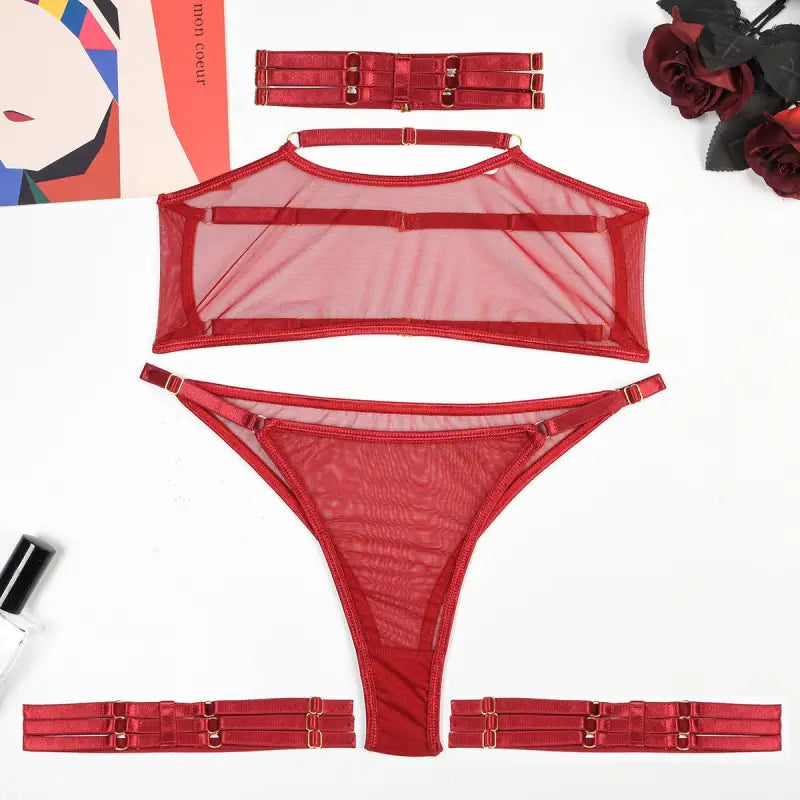 Red sheer mesh lingerie four piece set with halter top, thong bottom, and garter straps
