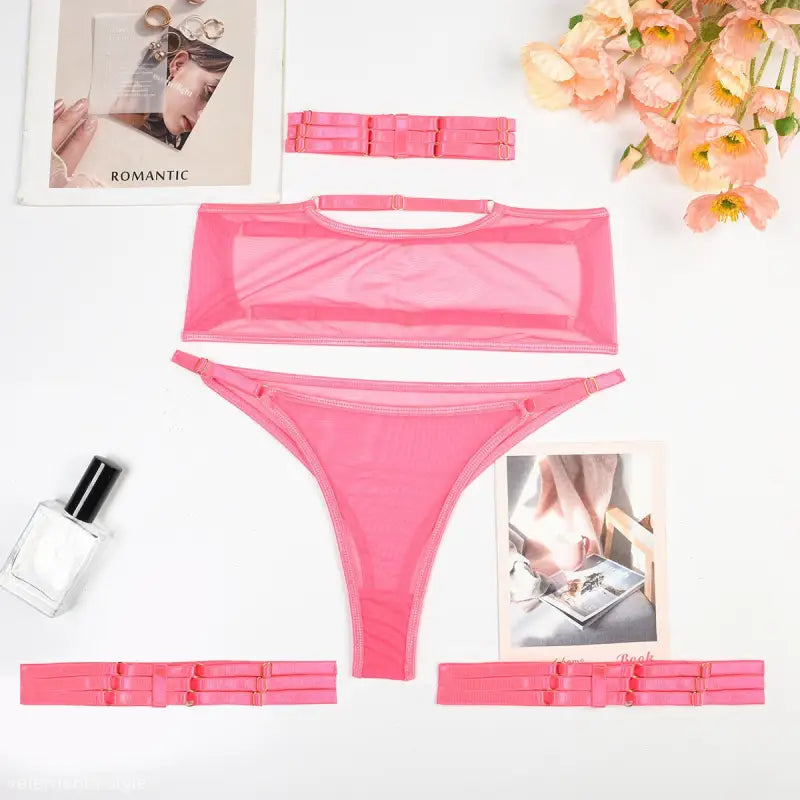 Pink mesh two-piece lingerie set with garter straps from the sexy four piece set