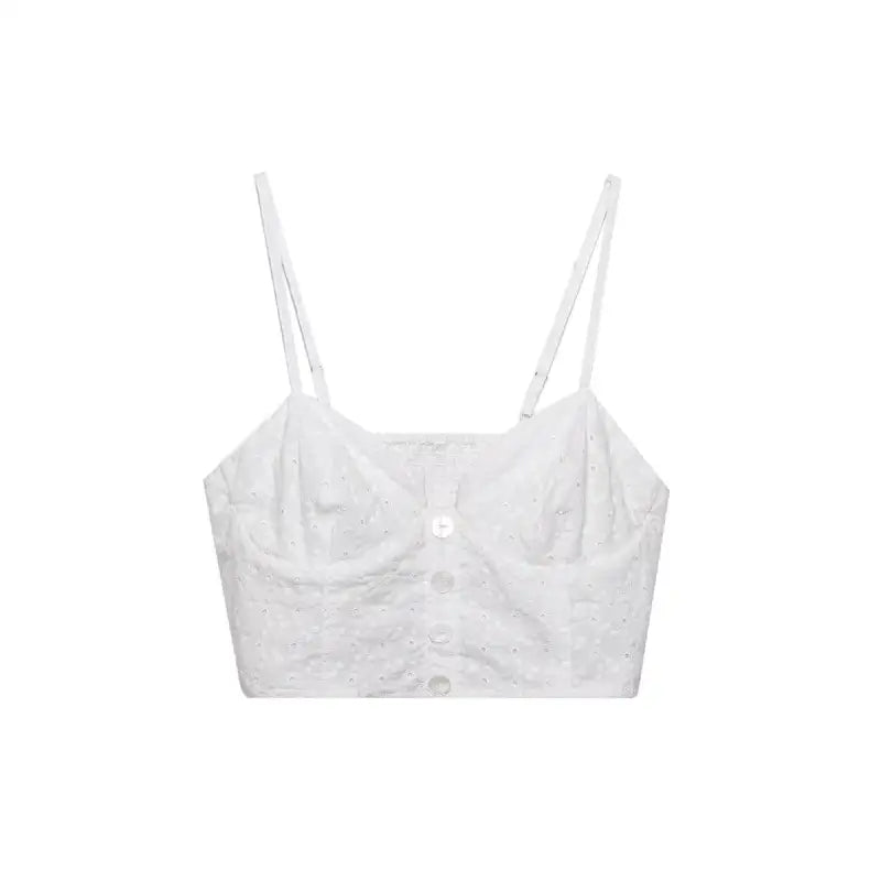 White eyelet crop top showcasing French Niche Hollow Cutout design for summer style