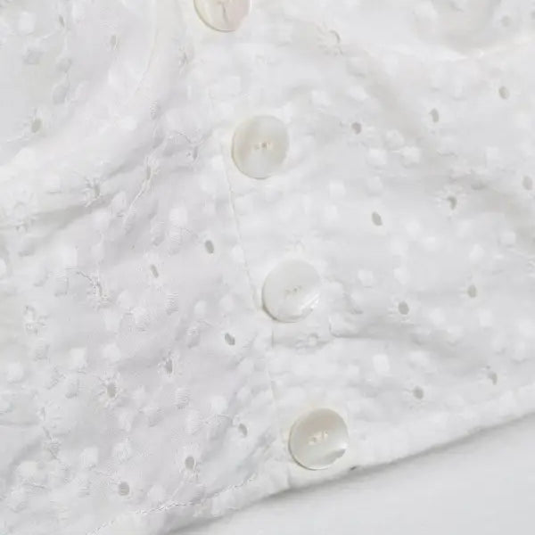 White eyelet fabric with buttons in a Sexy French Niche Hollow Cutout Cotton Crop Top