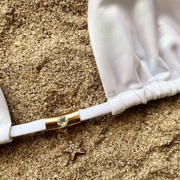 White bikini top with star charm from the sexy gradient swimsuit collection