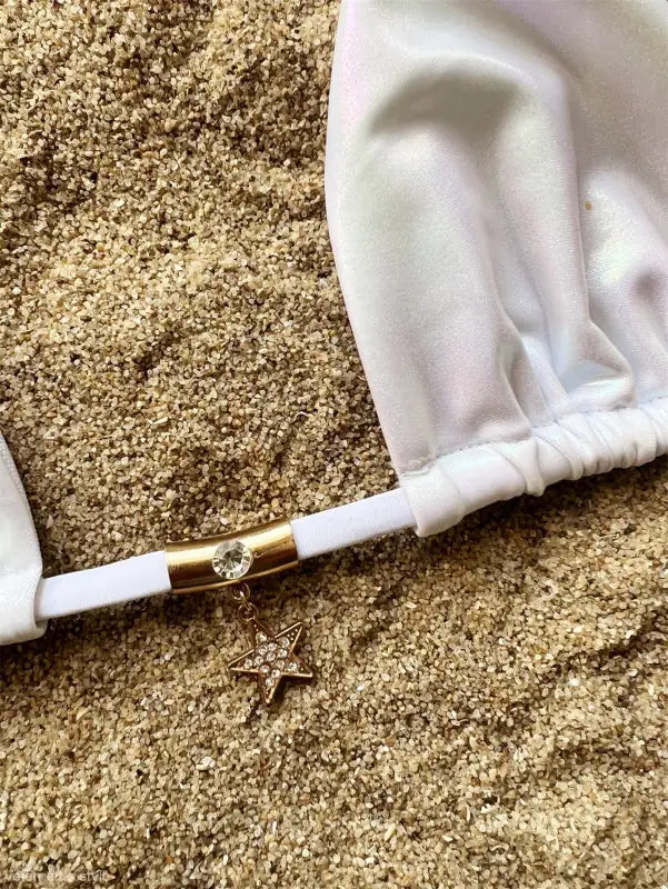 White bikini top with star charm from the sexy gradient swimsuit collection