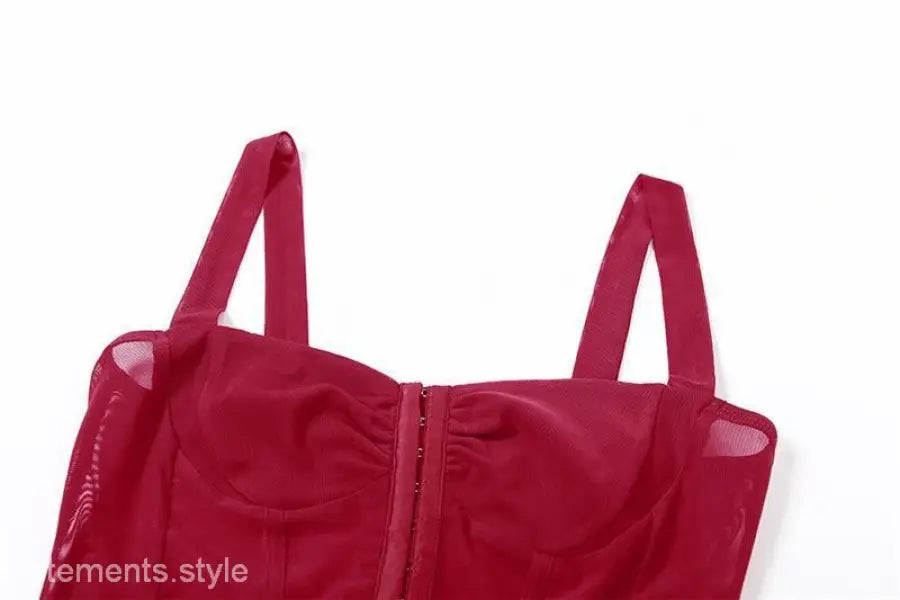 Red bustier-style top with shoulder straps and front closure, perfect for sexy halter spaghetti looks