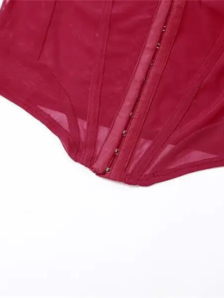 Red sheer bodysuit with hook-and-eye closure, featuring halter spaghetti straps and lace details