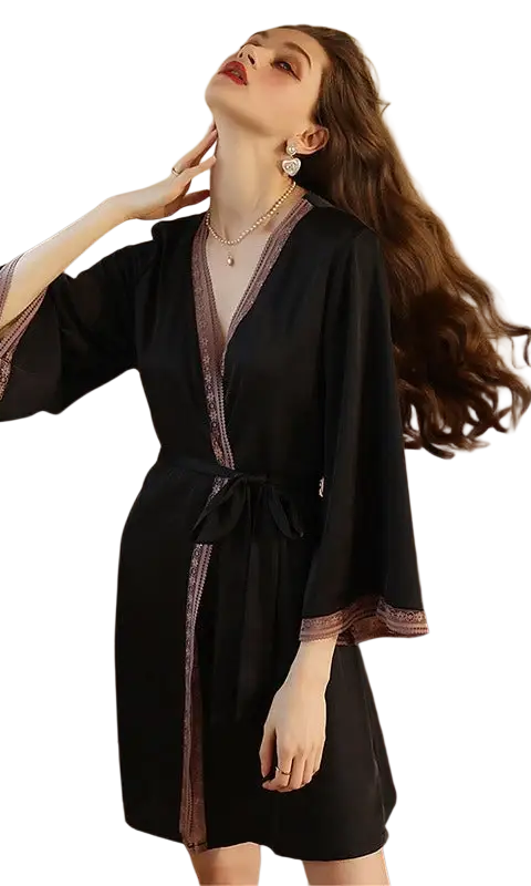 Woman in sexy ice silk robe with lace tulle trim, dramatic pose