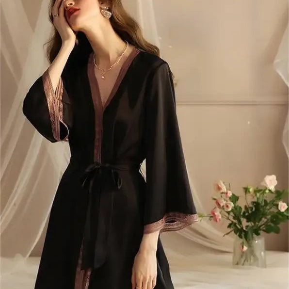 Black ice silk robe with pink lace trim, waist tie, long sleeves, and tulle detail
