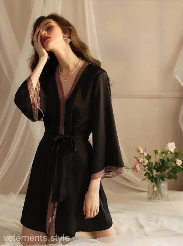 Black ice silk robe with pink lace trim, waist tie, long sleeves, and tulle detail