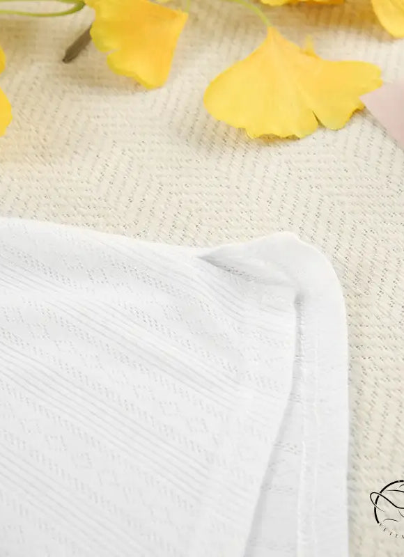 White textured fabric from knitted shorts homewear set with sleeveless crop top