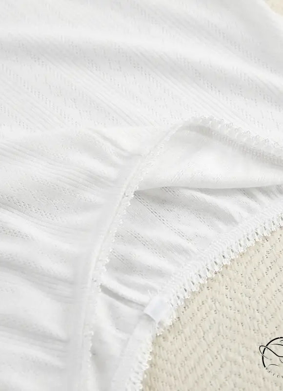White eyelet-lace trim cotton bedsheet from Knitted Shorts Homewear Set with Sleeveless Crop Top