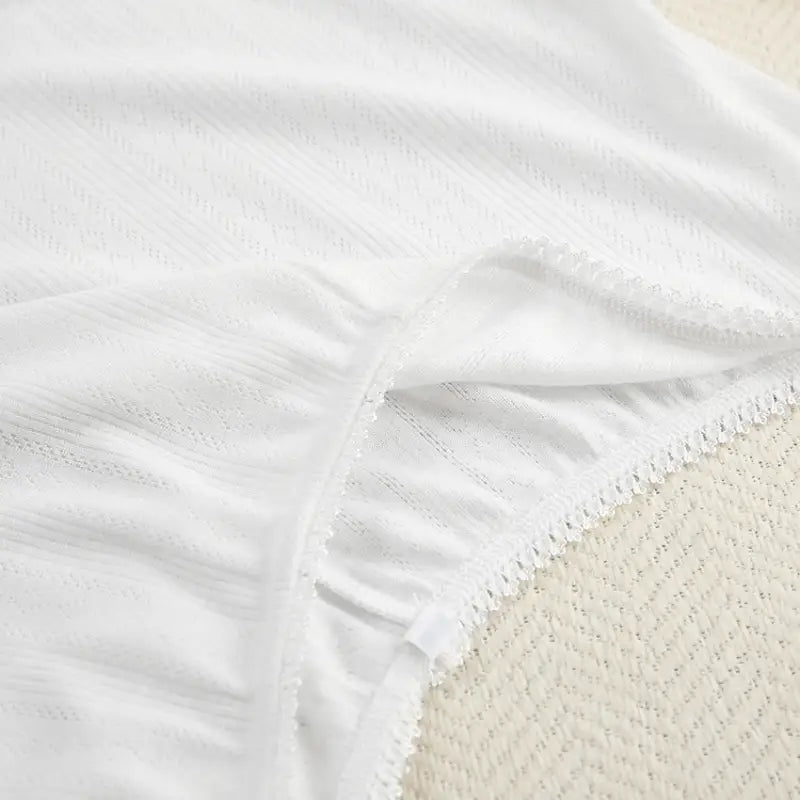 White eyelet-lace trim cotton bedsheet from Knitted Shorts Homewear Set with Sleeveless Crop Top
