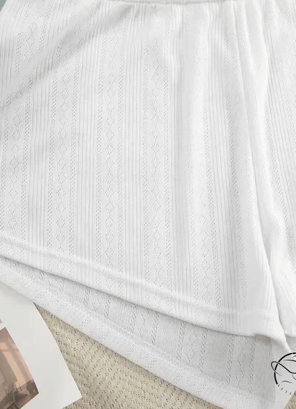 White eyelet knit shorts with ruffled hem from the Knitted Shorts Homewear Set for a stylish look