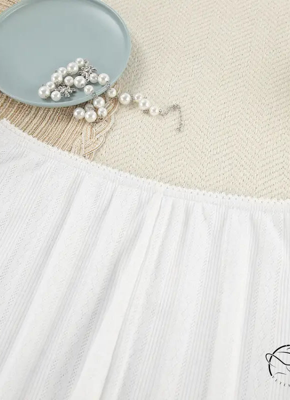 White off-shoulder textured top in sexy knitted shorts homewear set