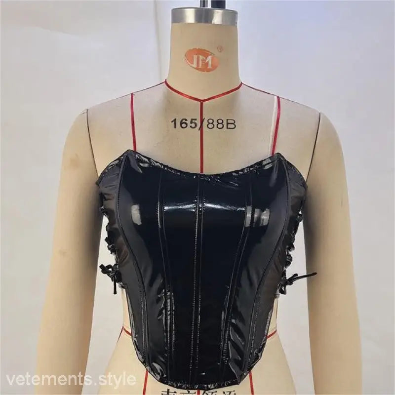 Shiny black patent leather corset with lacing, perfect for elegant fashion, free shipping available