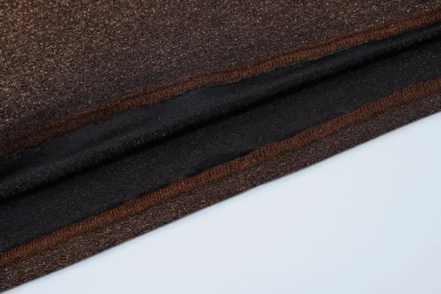 Brown and black fabric with stitching from a sexy lace hip skirt for summer style