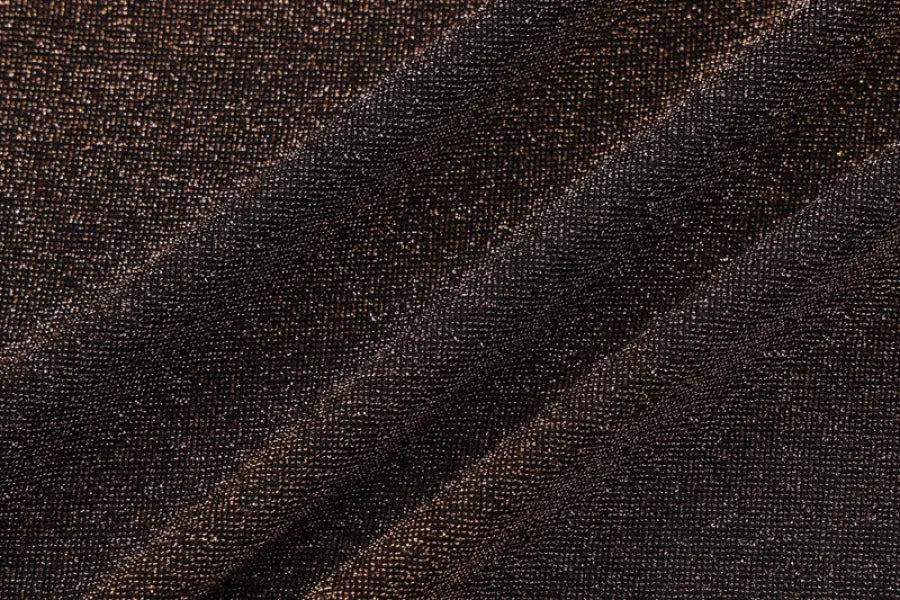 Dark shimmering textured fabric of a sexy lace hip skirt for summer hip skirt suit