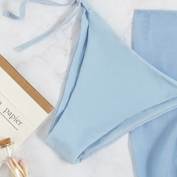 Light blue bikini top with tie straps.
