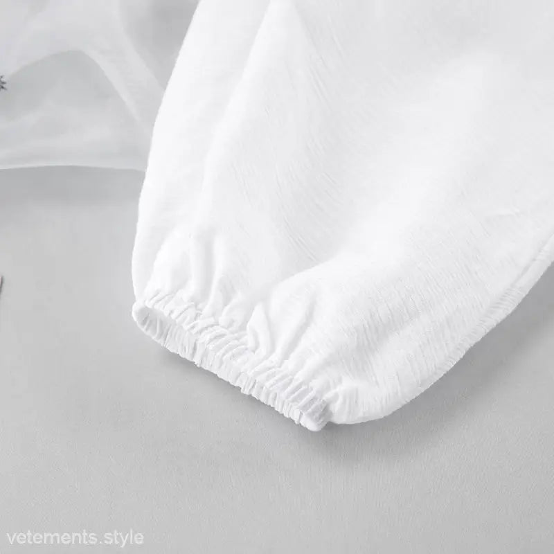 Elasticated cuff of a white sleeve in sexy long sleeve pajama set with shorts for Spring/Fall