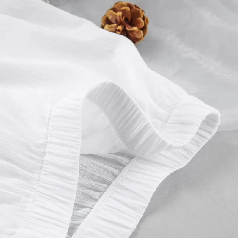 White pleated fabric with golden brooch on sexy long sleeve tie sleeve pajamas set