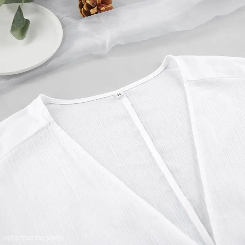 White V-neck top in lightweight fabric from sexy long sleeve pajamas with shorts set