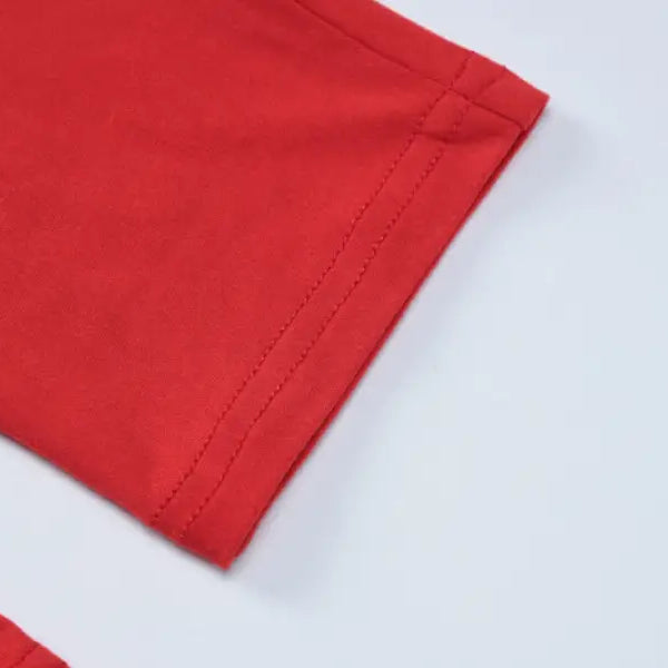 Red fabric sleeve of Metal Buckle Yoga Jumpsuit for Summer Wear showcasing sexy metal buckle