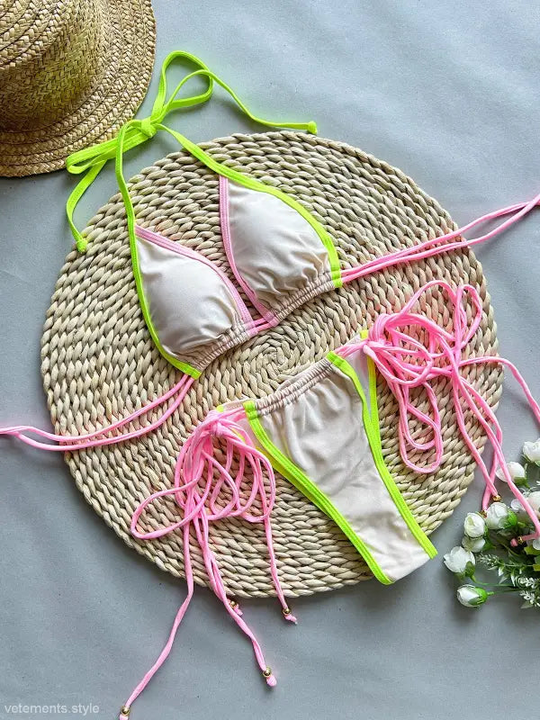 Beige bikini with neon trim in Multi Rope Split Nylon Swimsuit for Boho Summer Vacations