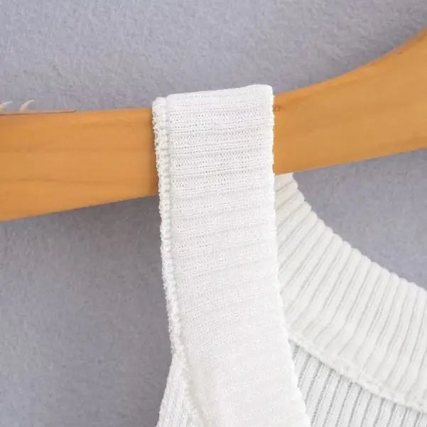 White ribbed tank top on hanger, perfect as a sexy pearl vest for summer style