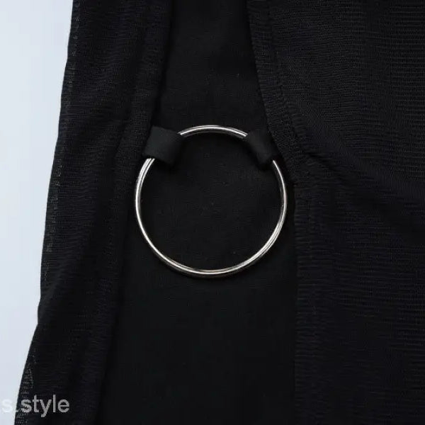 Silver ring detail on black fabric of sexy short mesh dress for summer parties