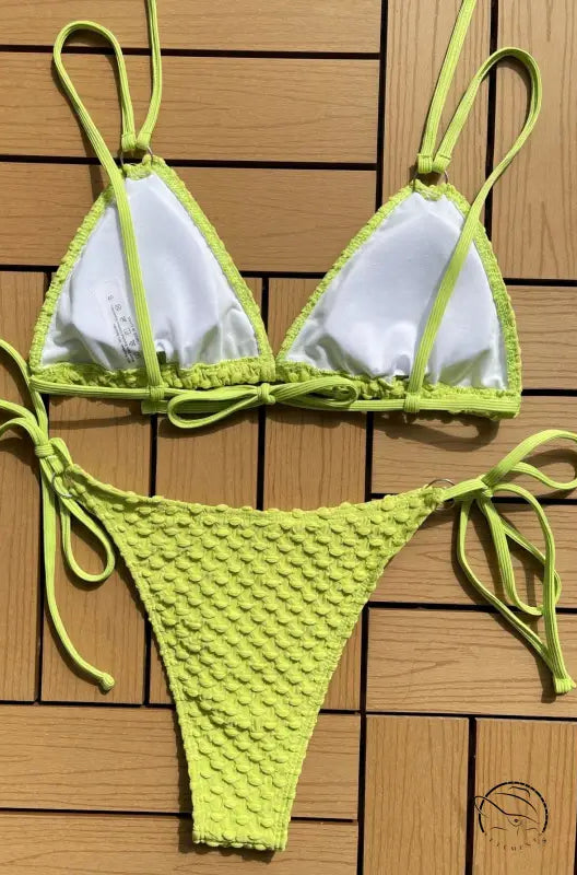 Sexy single swimsuit in lime green and white with boho tie strap