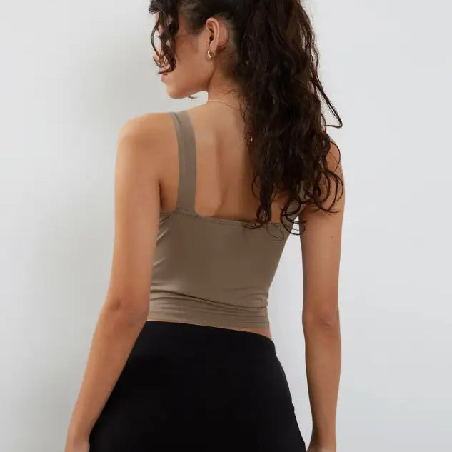 Fashionable slim cutout camisole top by Vetements Style with brown tank and black skirt