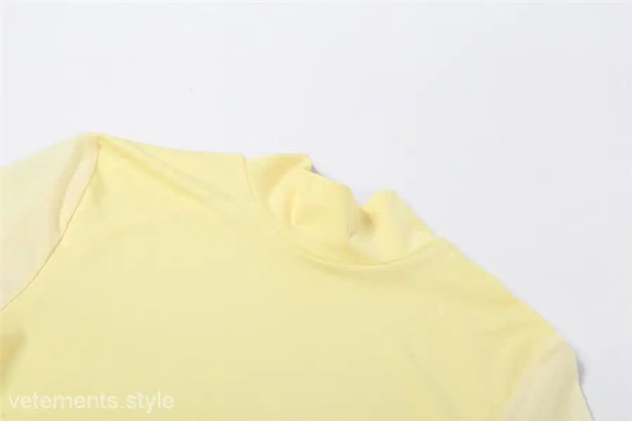 Pale yellow shirt jumpsuit collar and shoulder area, slim fit t shirt for summer wear