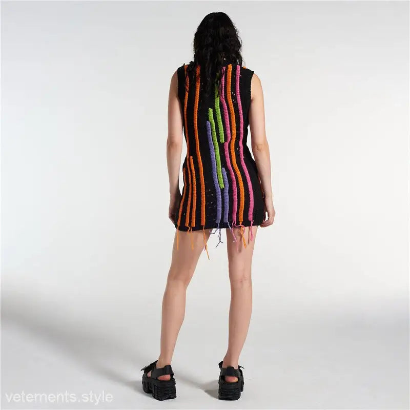 Black knit mini dress with colorful stripes, stylish slim street dress ideal for trendy street fashion