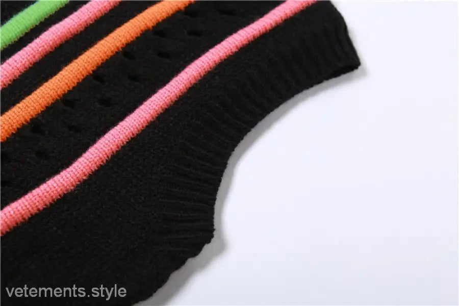 Black knit top with colorful stripes as part of the sexy slim street dress collection