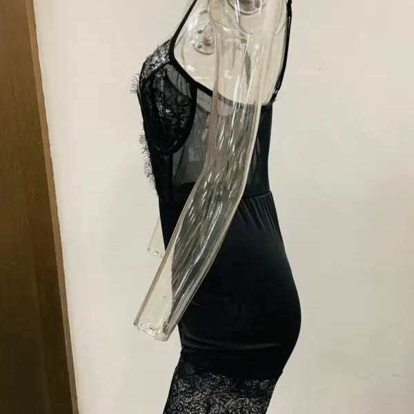 Black lace-trimmed bodycon dress on transparent mannequin, perfect for sexy strappy low-cut looks