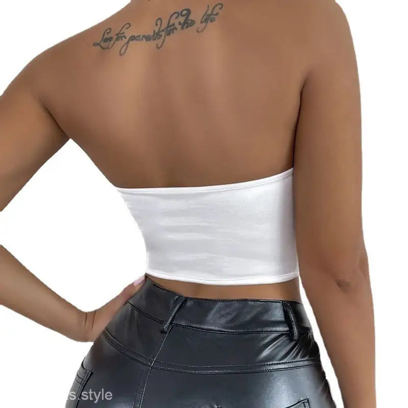 Woman wearing a sexy summer slim corset tube top in glossy polyester fabric
