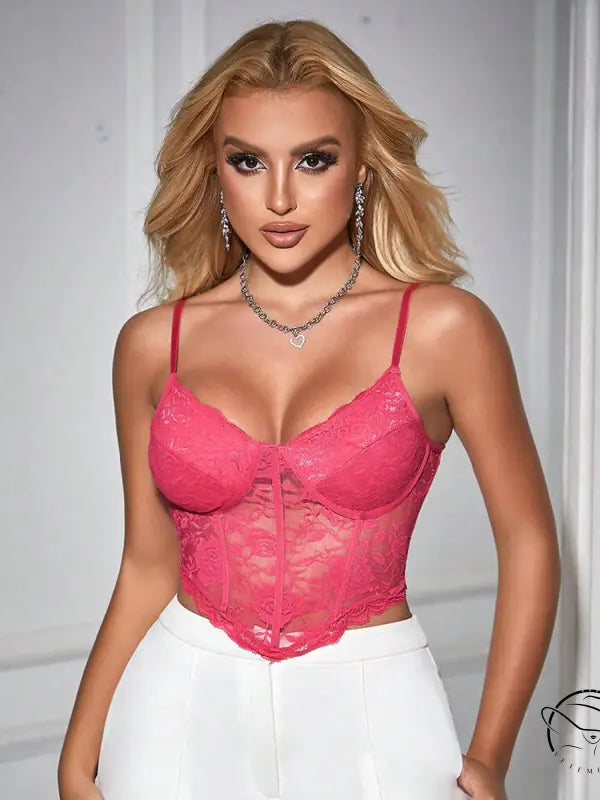 Blonde woman wearing a sexy sweet spicy boning corset crop top in lace and tulle