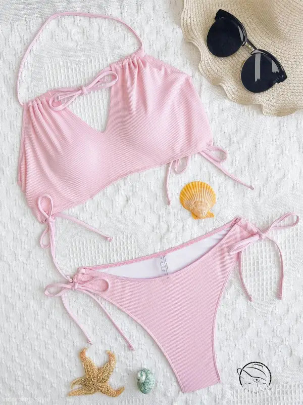 Pink sexy tied swimsuit with boho tie straps for summer vacations