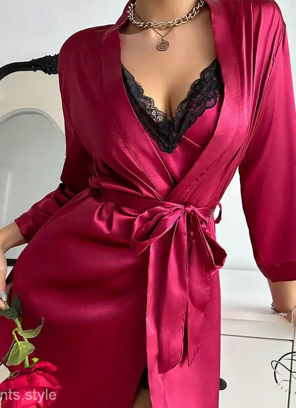Vibrant fuchsia silk robe with black lace trim and waist tie from sexy Vetements pajamas collection