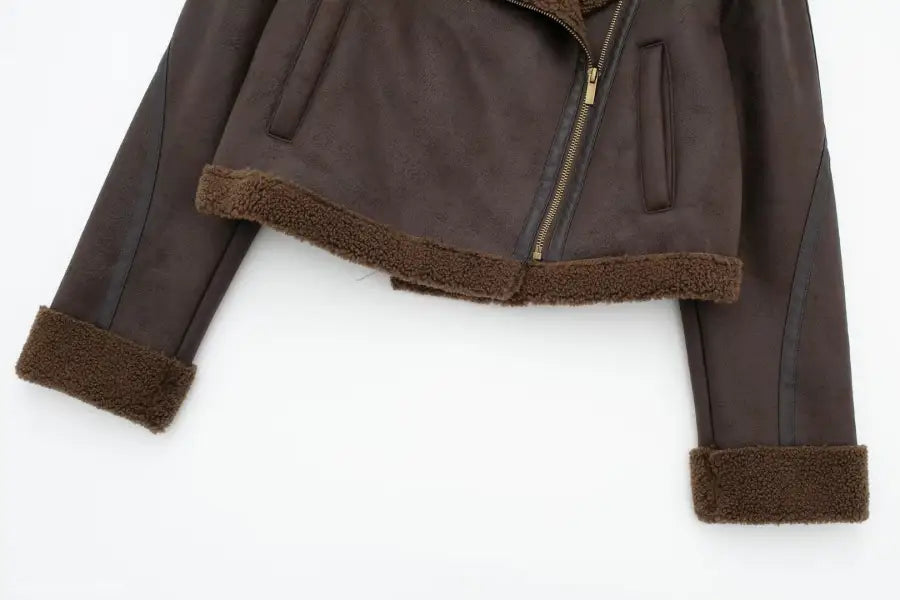 Brown leather jacket with fur trim and diagonal zipper, ideal for fleece short stitching coats